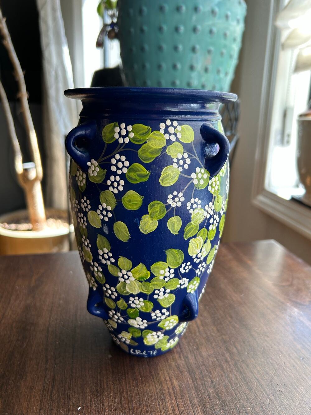 Vintage terracotta hand-painted dark blue ceramic vase floral and foliage motif